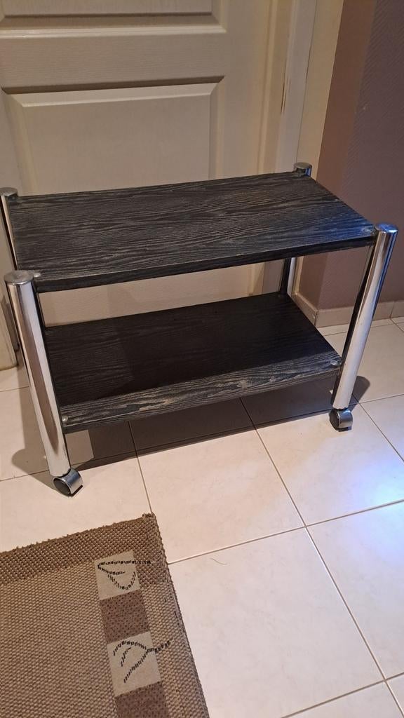 Table noir gris à roulette, Enlèvement