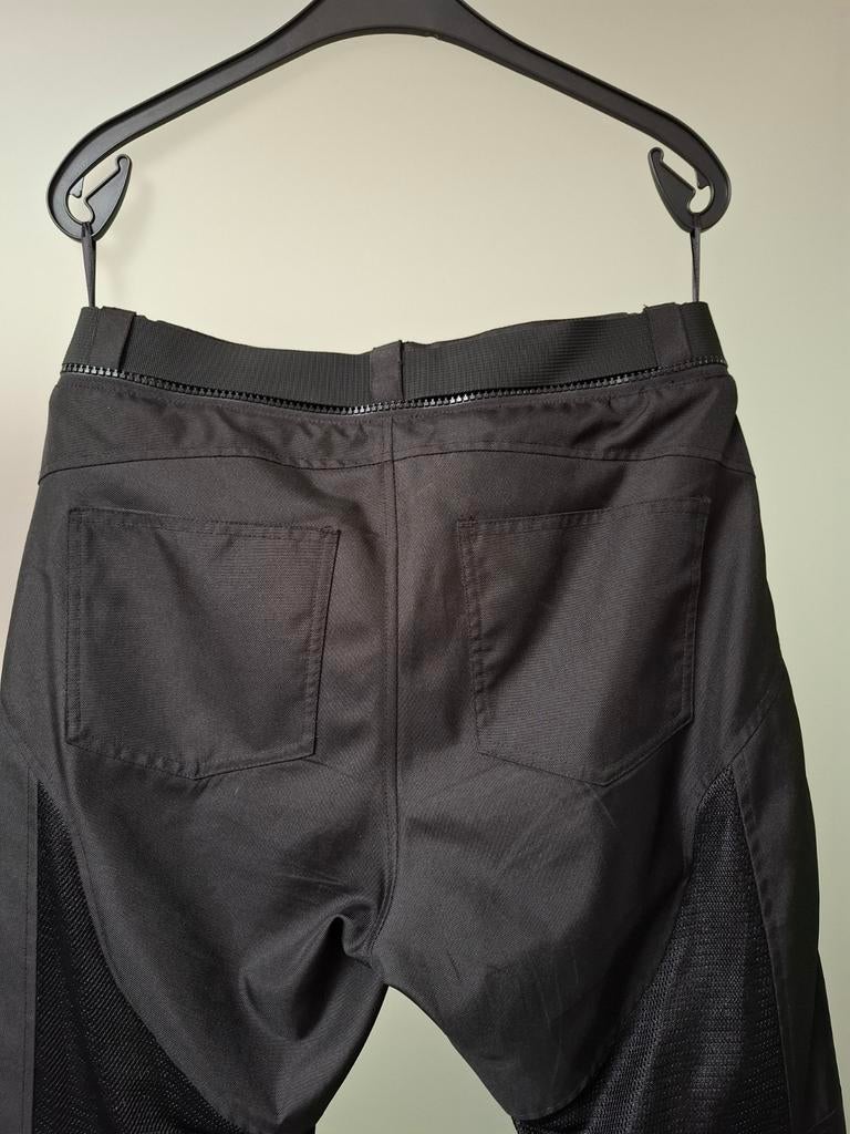 Motorbroek 50 euro, Ophalen