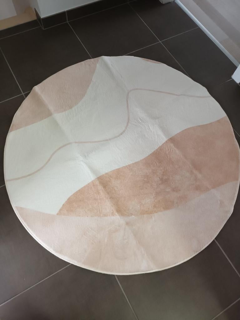 Ronde tapijt, Ophalen