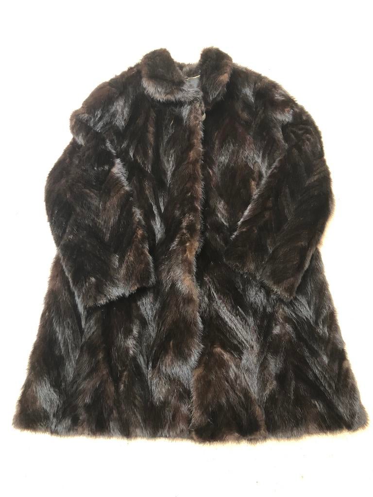 Nerts bontmantel, Ophalen, Gedragen