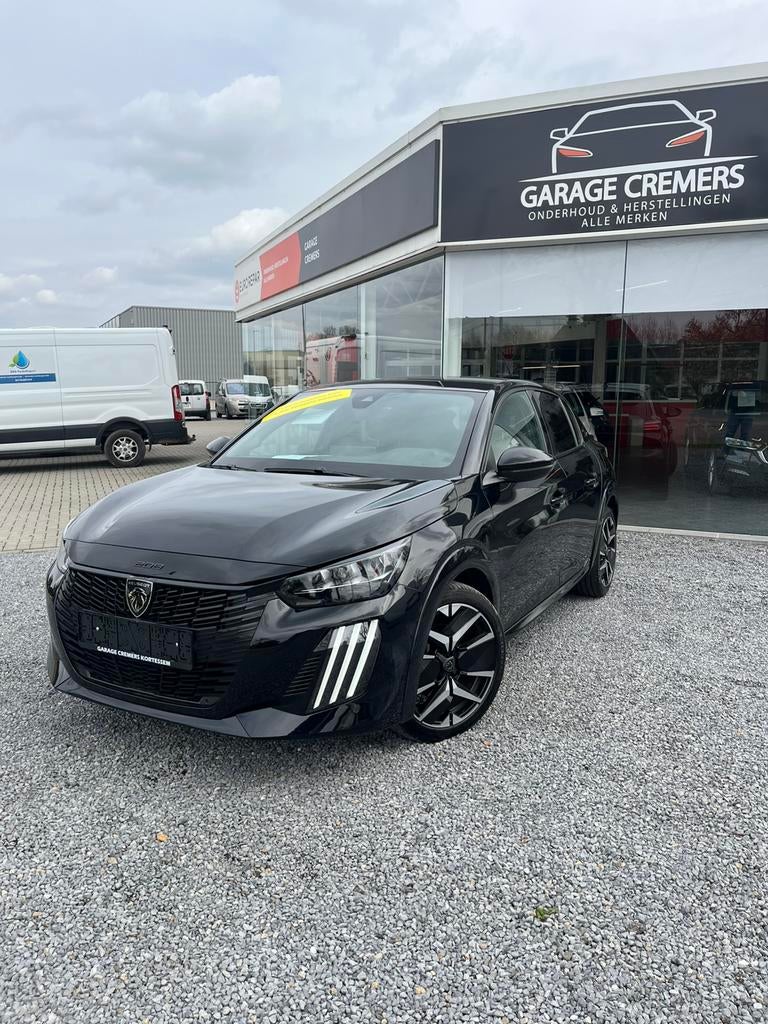 2 jaar Europese garantie Peugeot 208 GT 1.2 Turbo 74Kw/100, Auto's, Peugeot, Voorwielaandrijving, Leder en Stof, Zwart, 5 deurs