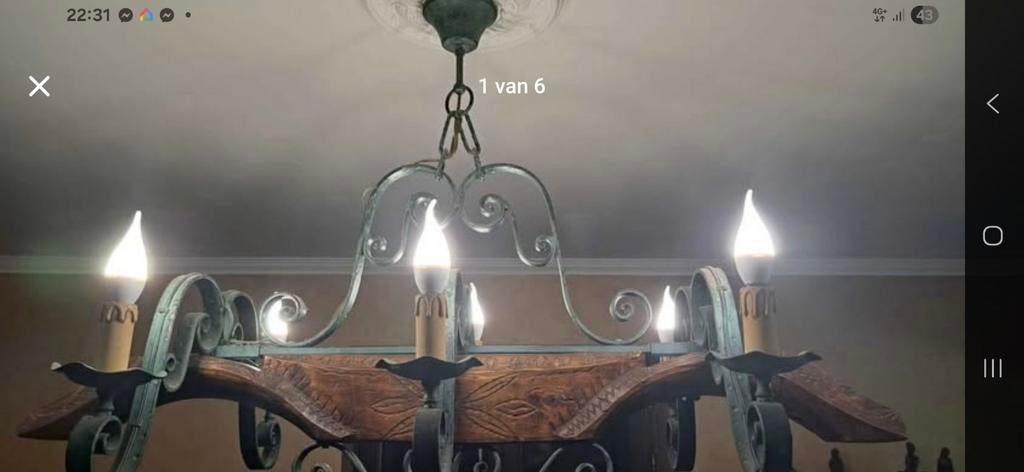 Grand lustre ancien en forme de joug de cheval, Enlèvement