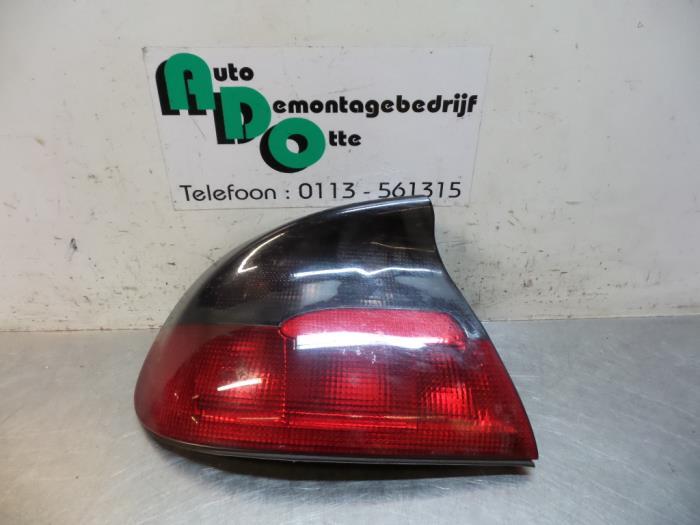 Achterlicht links van een Opel Tigra (Tigra 94-), Auto-onderdelen, Verlichting, Opel, Gebruikt, Ophalen of Verzenden