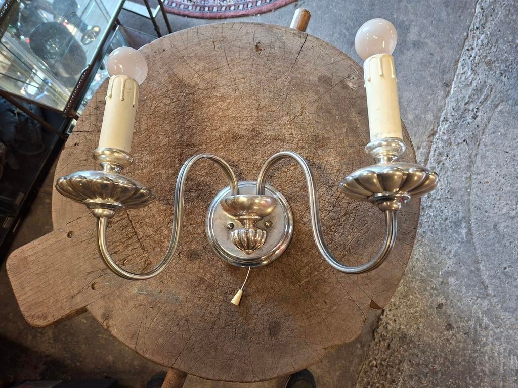 Sciolari wandlamp, Ophalen