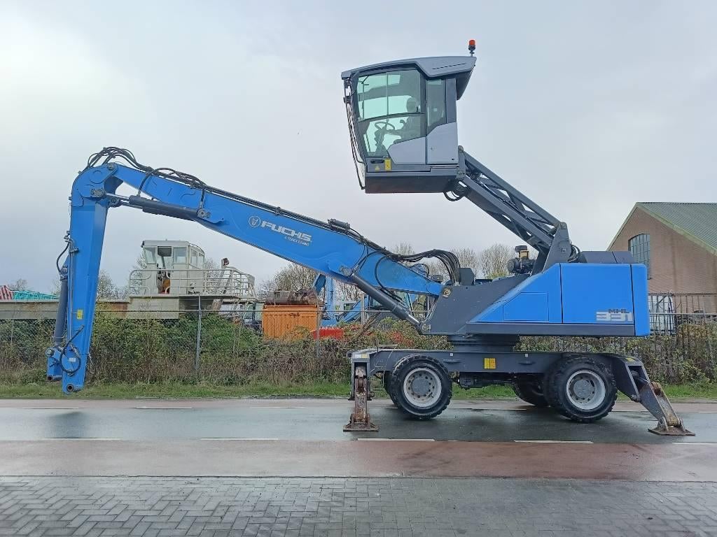Fuchs MHL 331 overslagkraan waste handler umslag bagger, Grue