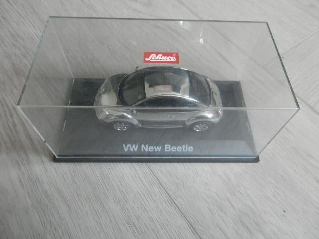 New Beetle chromé, échelle 1:43, Schuco, Enlèvement, Neuf, Voiture, Schuco
