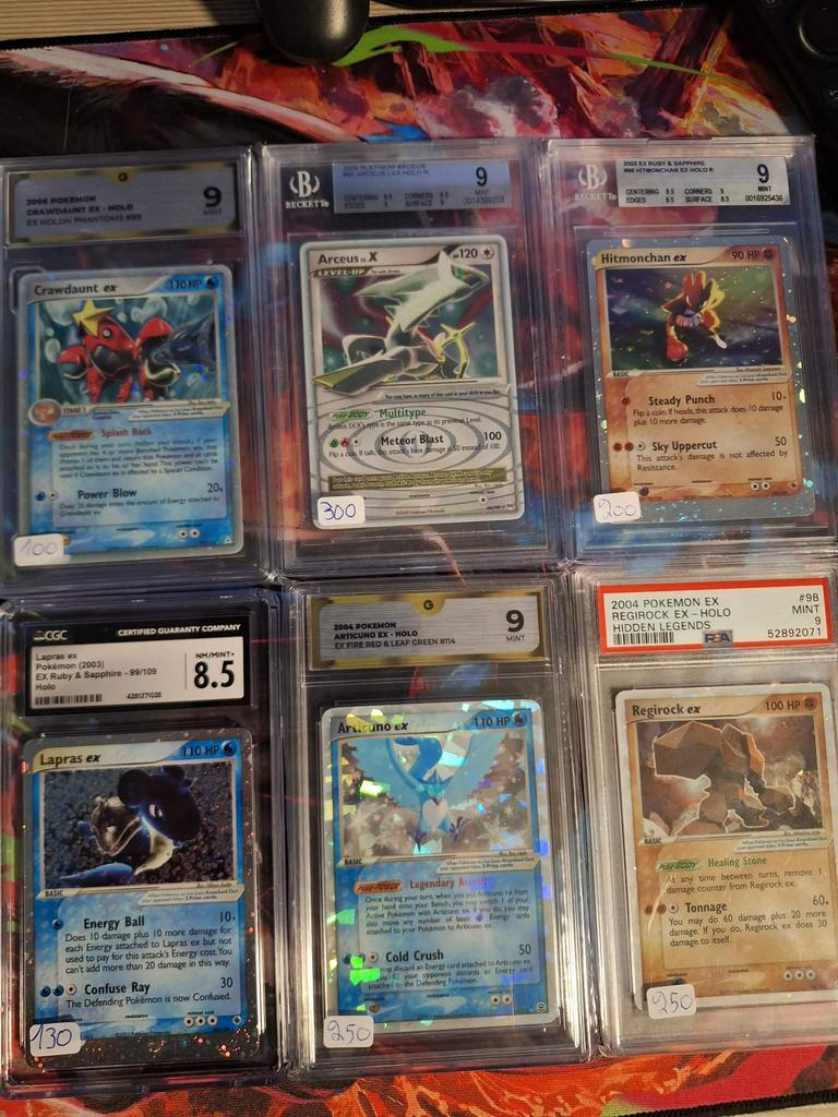 Graded pokemon Slabs, Hobby en Vrije tijd, Verzenden, Zo goed als nieuw