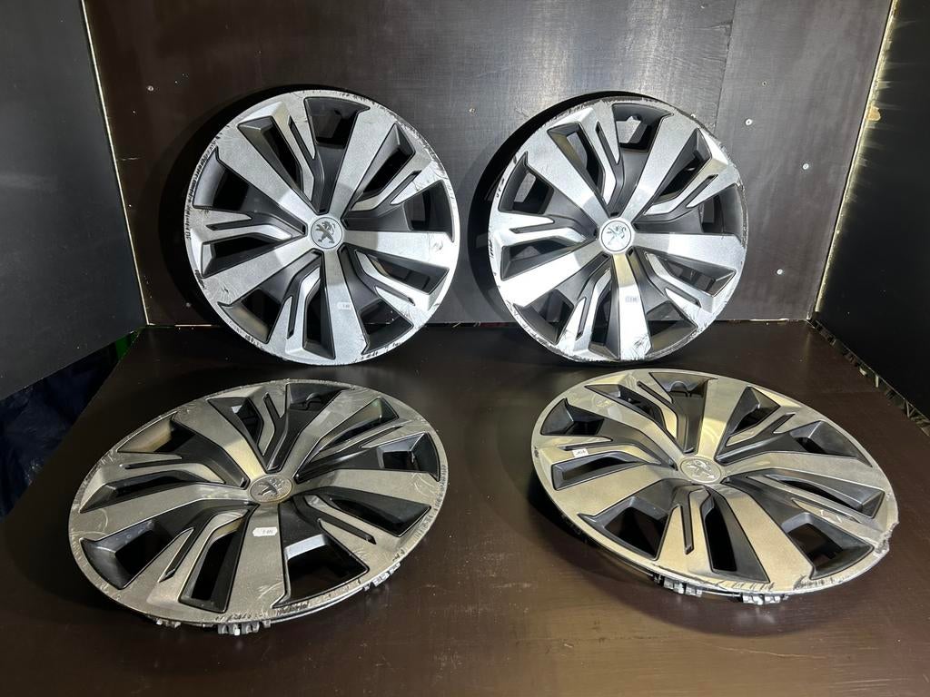 4 originele Peugeot 207,208,307,308 partner 16" wieldoppen, Ophalen of Verzenden, Gebruikt