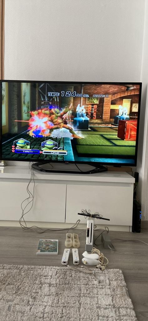 Nintendo Wii avec 2 manettes et 1 jeu, Enlèvement ou Envoi, Utilisé, Avec 2 manettes, Avec jeux