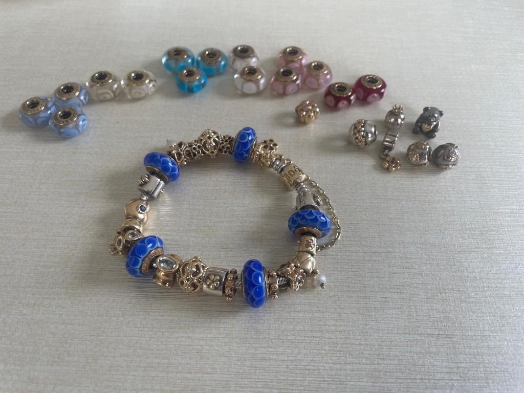 Gouden Pandora armband - zeer uniek en uitzonderlijk, Handtassen en Accessoires, Armbanden, Ophalen, Zo goed als nieuw, Goud, Met bedels of kralen