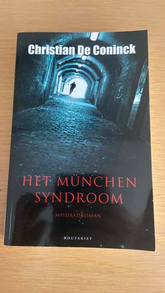 Christian De Coninck - Het München syndroom, Boeken, Thrillers, Zo goed als nieuw, Ophalen