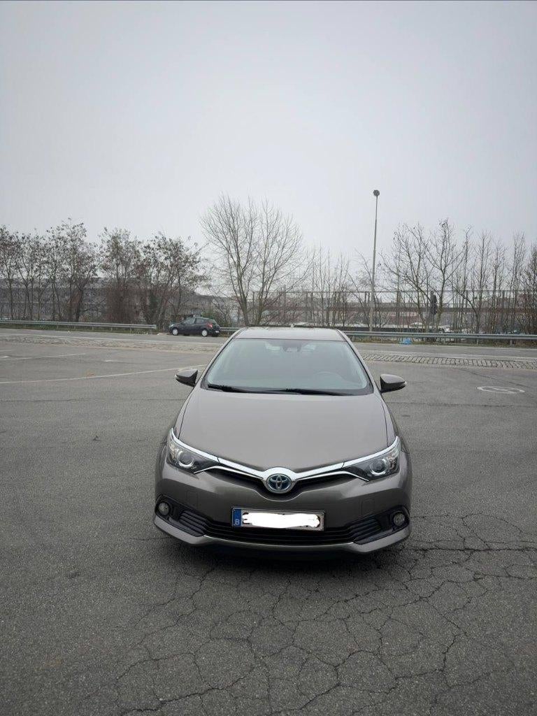 Toyota Auris 1.8 Hybrid Comfort, Auto's, Toyota, Beige, Bedrijf, 5 zetels, Hybride Elektrisch/Benzine