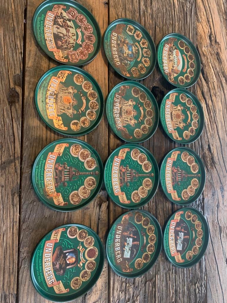 12 Metalen onderzetters van het Duitse bier Underberg., Verzamelen, Ophalen of Verzenden, Zo goed als nieuw