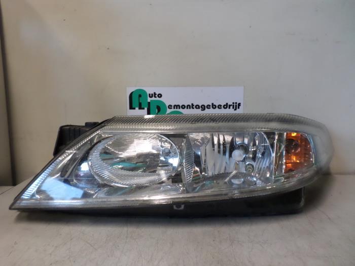 Phare gauche d'un Renault Laguna (Laguna 01-), Autos : Pièces & Accessoires, Renault, -, 3 mois de garantie, Utilisé