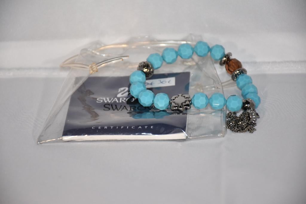 Bracelet bleu Swarovski, Enlèvement, Comme neuf, Bijou ou Montre