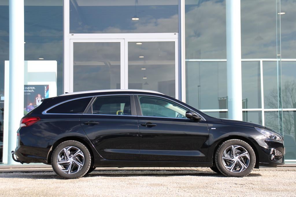 Hyundai i30 Wagon 1.5T-GDi TECHNO MHEV Automaat 160 PK *CAM*, Auto's, Stof, Gebruikt, Zwart, Bedrijf