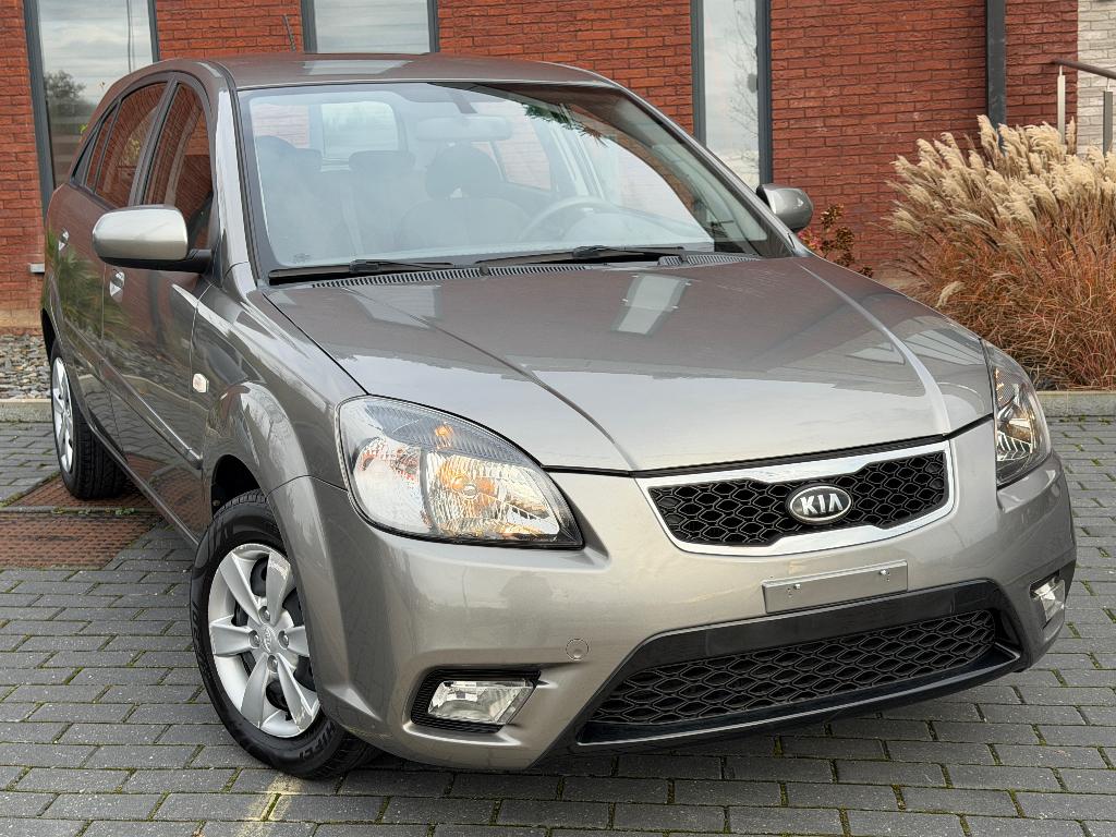 Kia Rio ( 2011 ) 1.4i ( 97Ch ) 1er propriétaire (139.566Km), Auto's, Kia, Voorwielaandrijving, Euro 5, Stof, 139 g/km