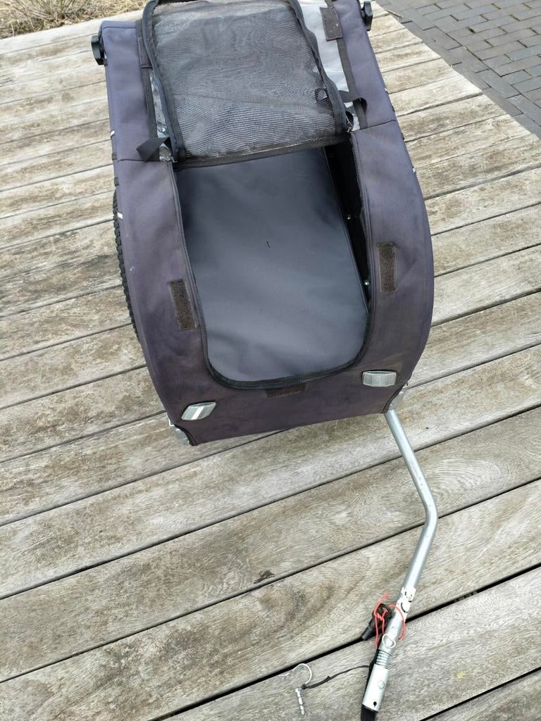 Fietskar voor hond, Ophalen