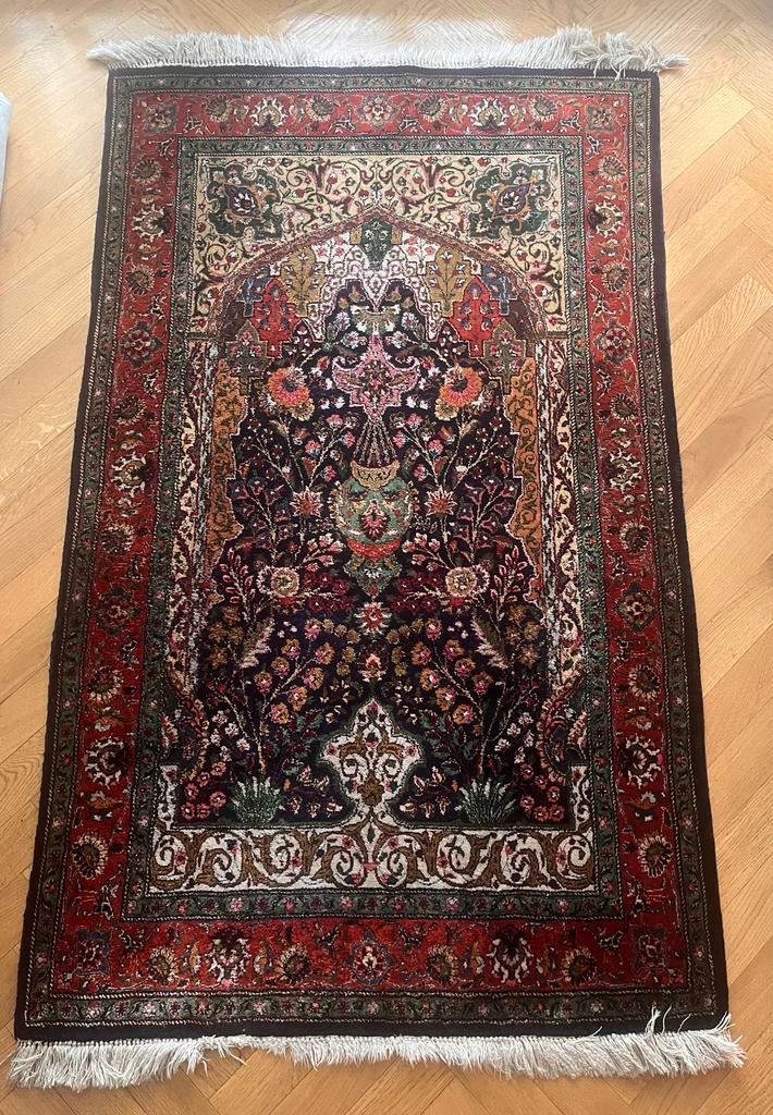 Perzisch tapijt van 100% zijde, Ophalen