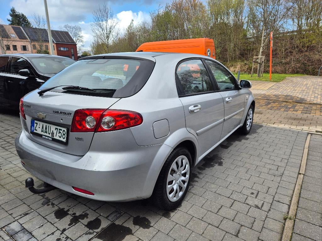 Chevrolet Lacetti / Opel Astra 1.4benzine 5drs AC 62.000kms, Auto's, Chevrolet, 4 cilinders, Bedrijf, Euro 4, Zilver of Grijs