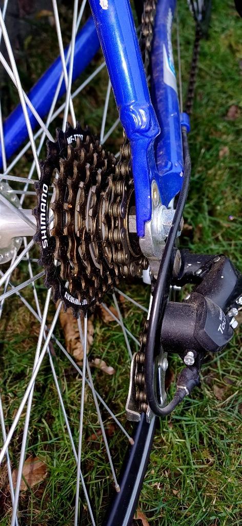 jongens koersfiets, Enlèvement, Comme neuf, Staat op de fietskader, Vitesses