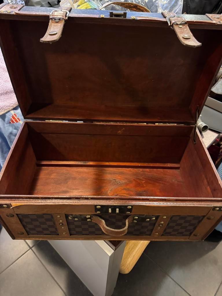 Koffer Damier, Ophalen