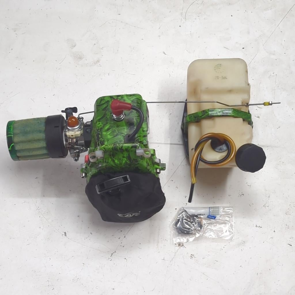 FG Zenoah 26cc motor + tank & filter, getest in goede staat, Hobby en Vrije tijd, Benzine, Gebruikt, Ophalen of Verzenden, Onderdeel