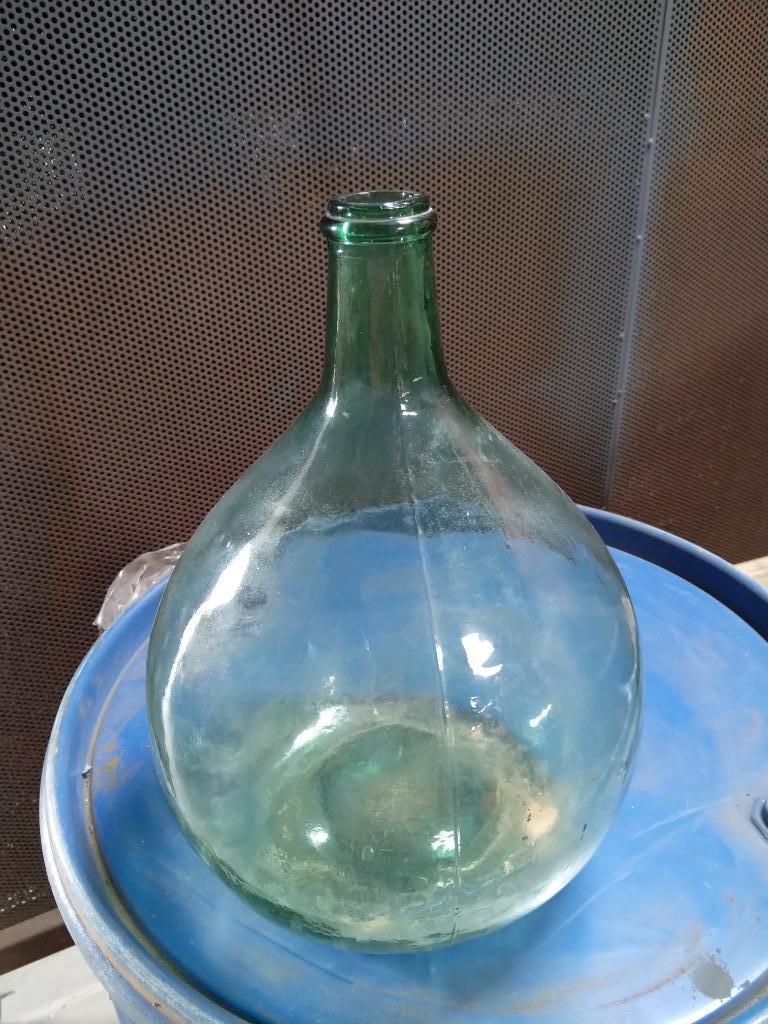 dame Jeanne fles groen, Ophalen