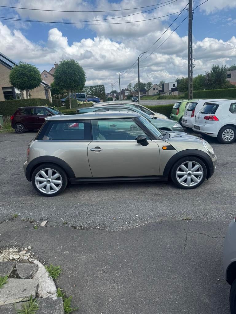 Mini one 1.4 70kw benzine bj2007 km132750 1jaar garantie, Auto's, Mini, Leder en Stof, Bedrijf, Handgeschakeld, Cooper