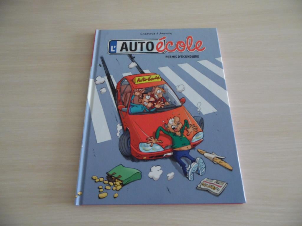 L'AUTO ÉCOLE   PERMIS D'ÉCONDUIRE, Livres, Enlèvement ou Envoi, Une BD, Comme neuf, Cazenove & Amouriq