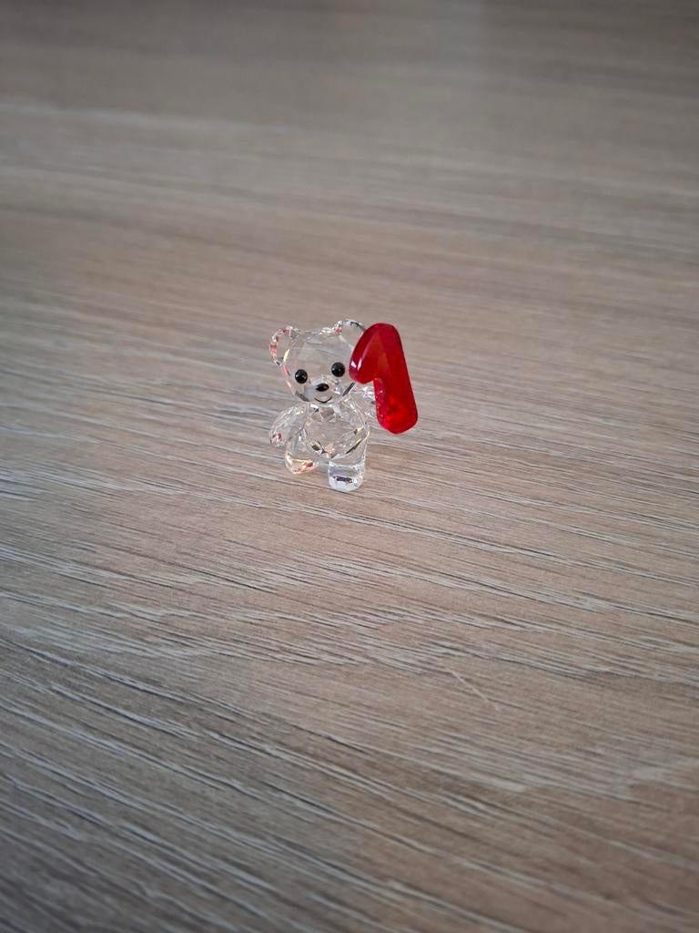 Swarovski kris beer: cijfer 1, Ophalen