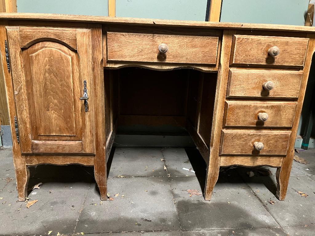 Houten bureaumeubel, Ophalen