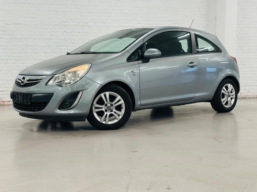 Opel Corsa benzine 2011 met keuring, Auto's, Euro 5, Bedrijf, Handgeschakeld, Zilver of Grijs