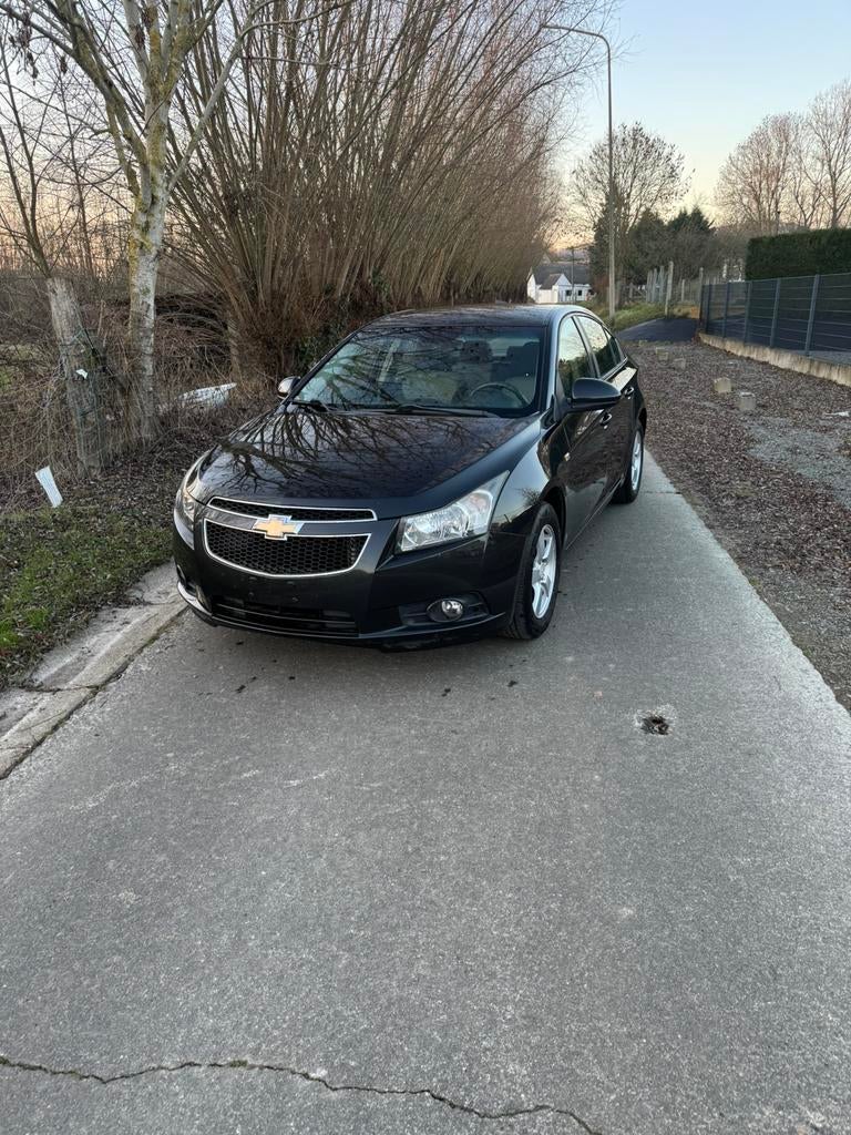 Chevrolet cruz 1.6benzine euro5 km:133150 bj2010 1j garantie, Auto's, Chevrolet, Euro 5, Handgeschakeld, 5 deurs, Parkeersensor