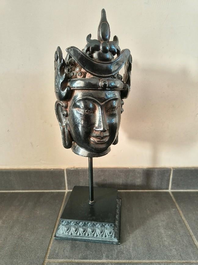 Oosters Boeddha-hoofd op standaard, Ophalen