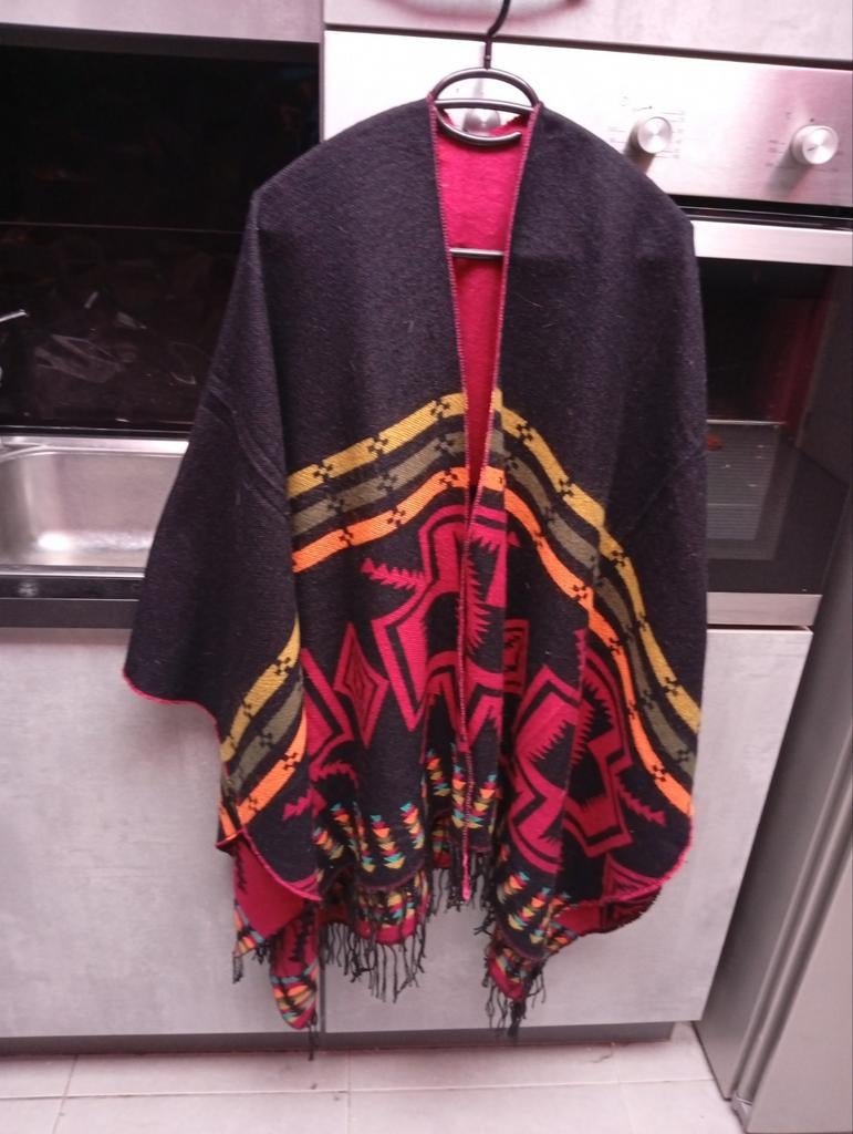 1 omkeerbare poncho