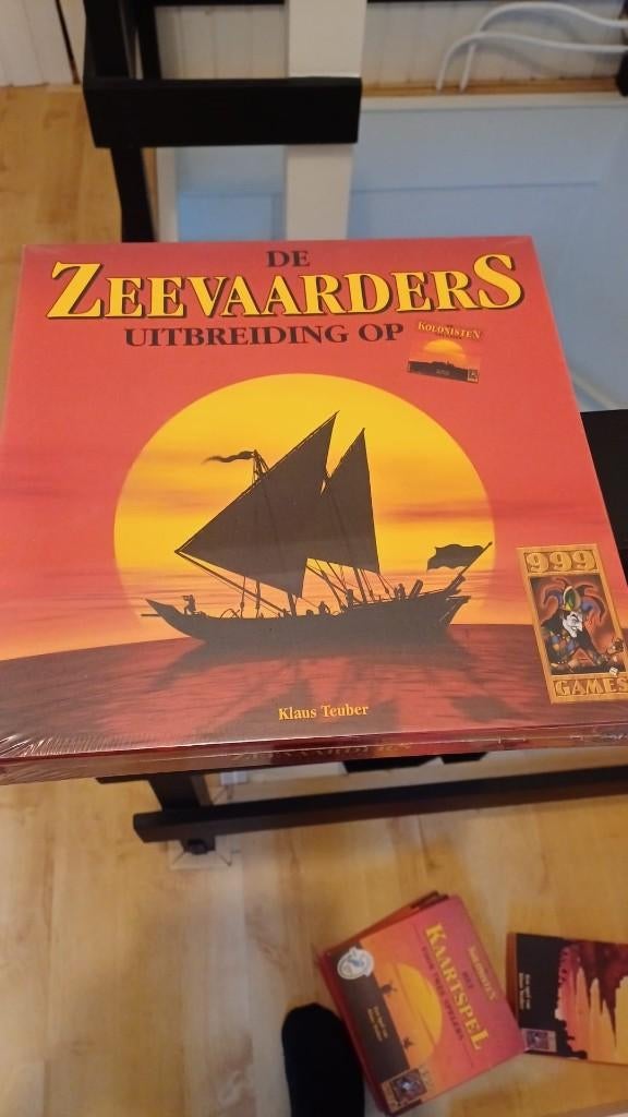 bordspel seal Kolonisten Catan Zeevaarders rode doos hout sp, Een of twee spelers, Ophalen of Verzenden, Nieuw, 999 Games