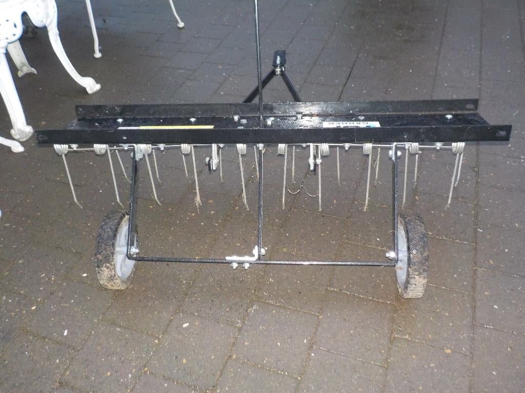 Werktuig voor achter zitmaaier, Ophalen