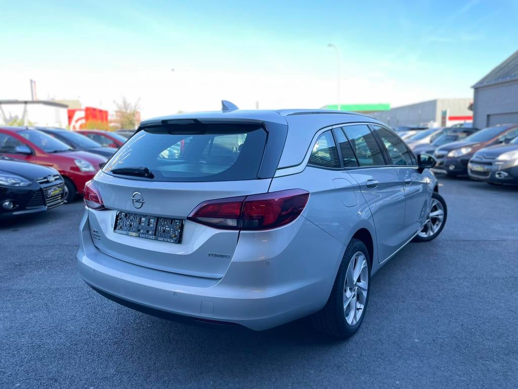 Opel Astra 1.4 benzine | Airco | Gps | Cruise | GARANTIE |, Autos, Argent ou Gris, Entreprise, 5 portes, 117 g/km