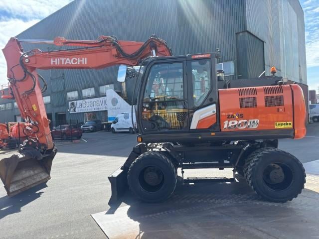 bandenkraan Hitachi ZX180W-7, Zakelijke goederen, Machines en Bouw | Kranen en Graafmachines, Ophalen, Graafmachine