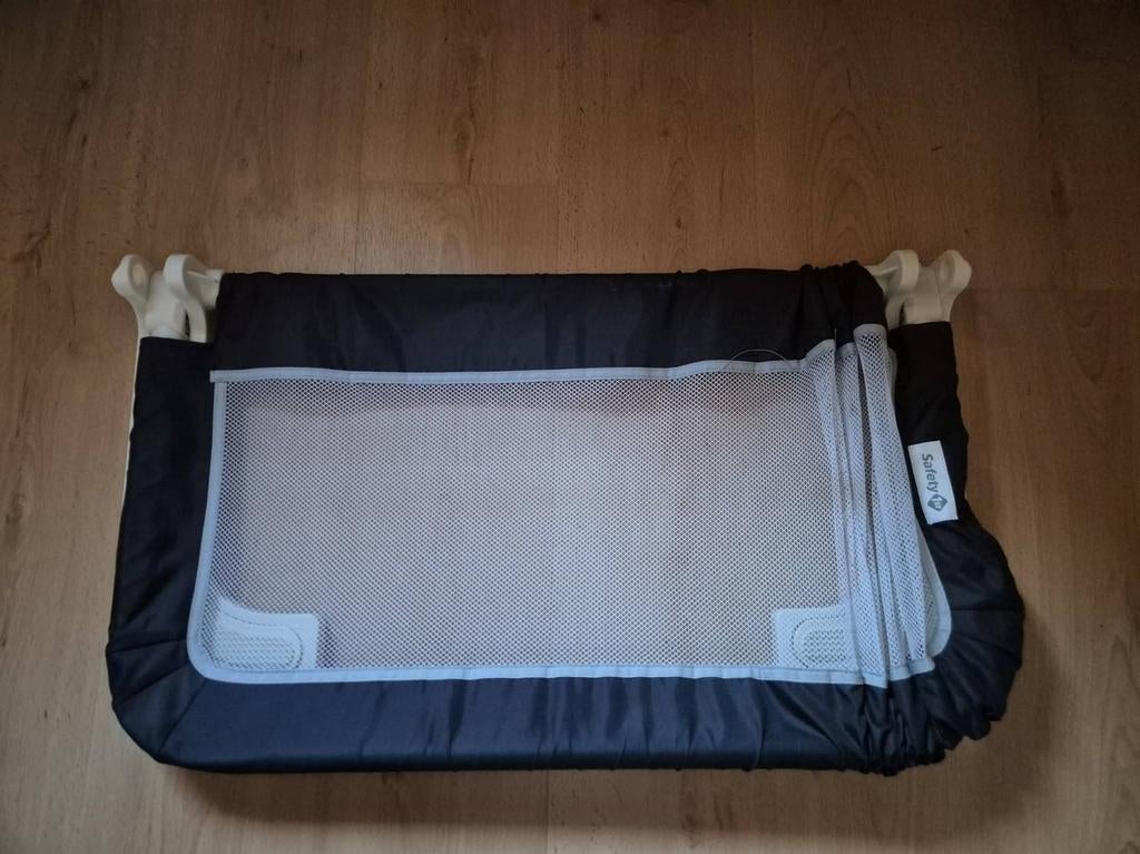 Barrière de lit repliable