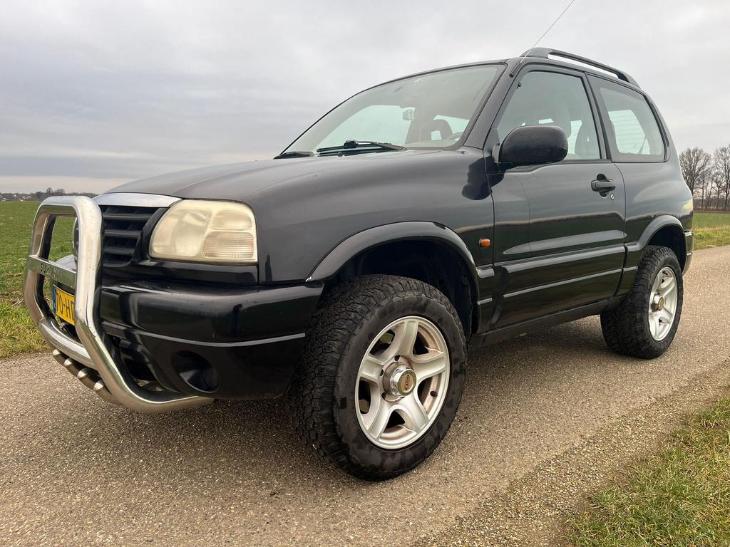 Te koop zeer mooie Suzuki Grand Vitara 1.6 Metal Top 4x4, Auto's, Suzuki, Stof, Grand Vitara, Bedrijf, Handgeschakeld