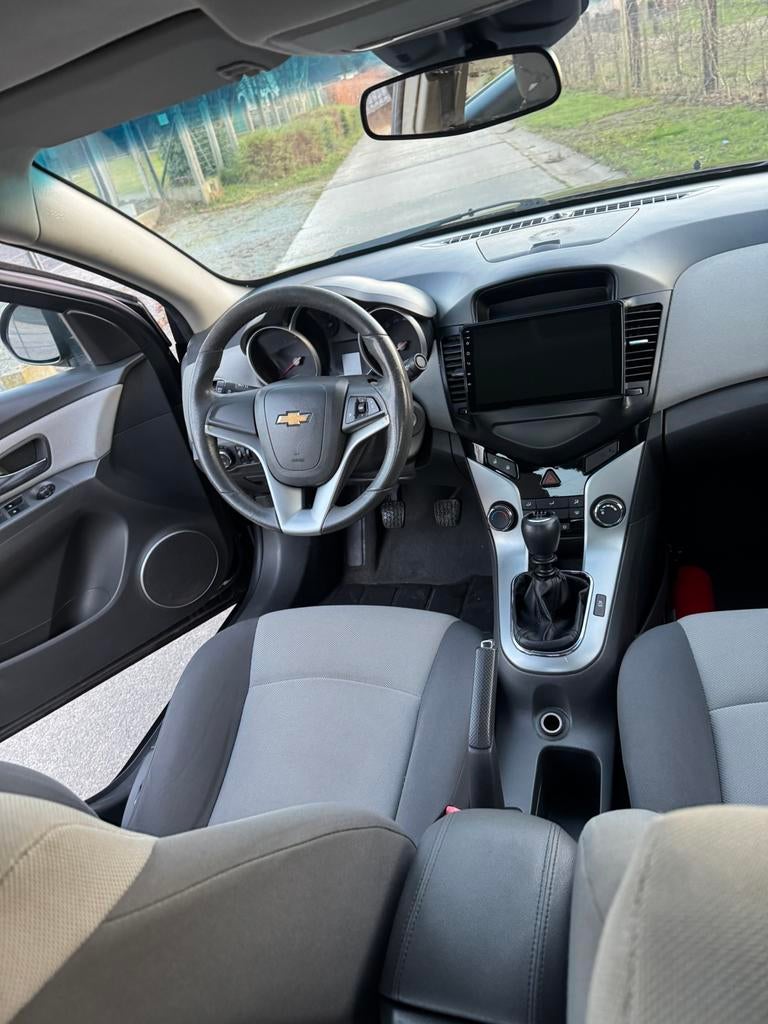 Chevrolet cruz 1.6benzine euro5 km:133150 bj2010 1j garantie, Auto's, Chevrolet, Euro 5, Handgeschakeld, 5 deurs, Parkeersensor
