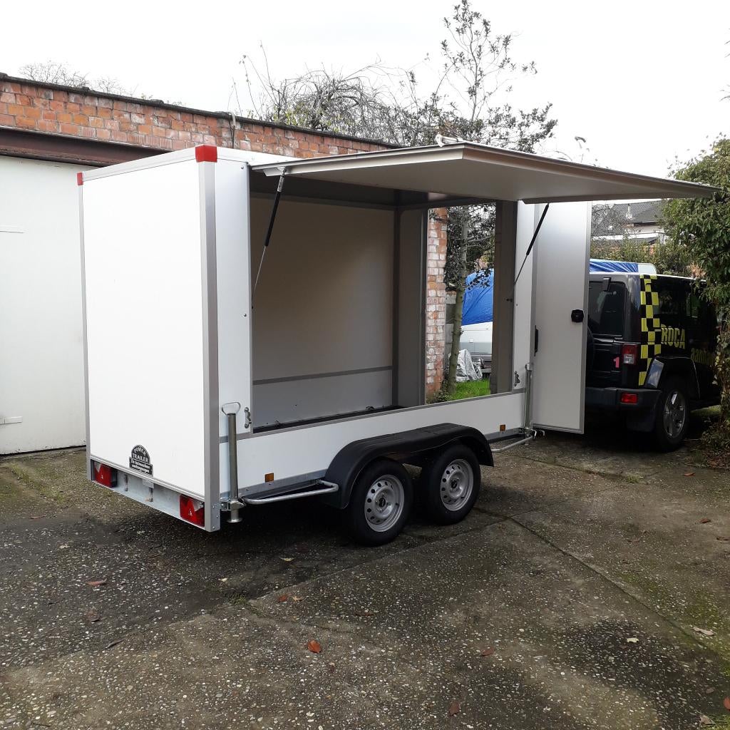gesloten aanhangwagen met zijluik, Auto diversen, Ophalen