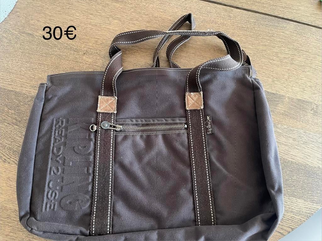 Sac Kipling, Enlèvement, Comme neuf