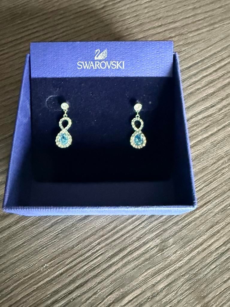 Boucles d'oreilles Infinty Swarovski, Enlèvement ou Envoi, Comme neuf, Bleu