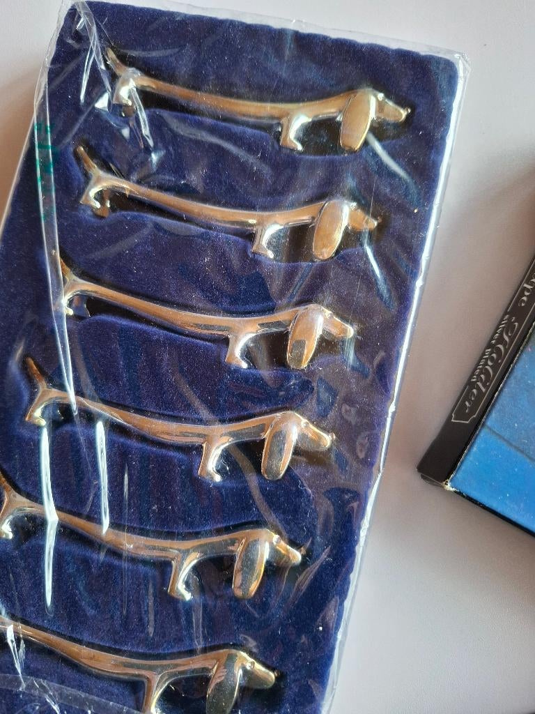 Bestek - Messenleggers (Teckelmotief), Huis en Inrichting, Keuken | Bestek, Ophalen, Nieuw, Zilver