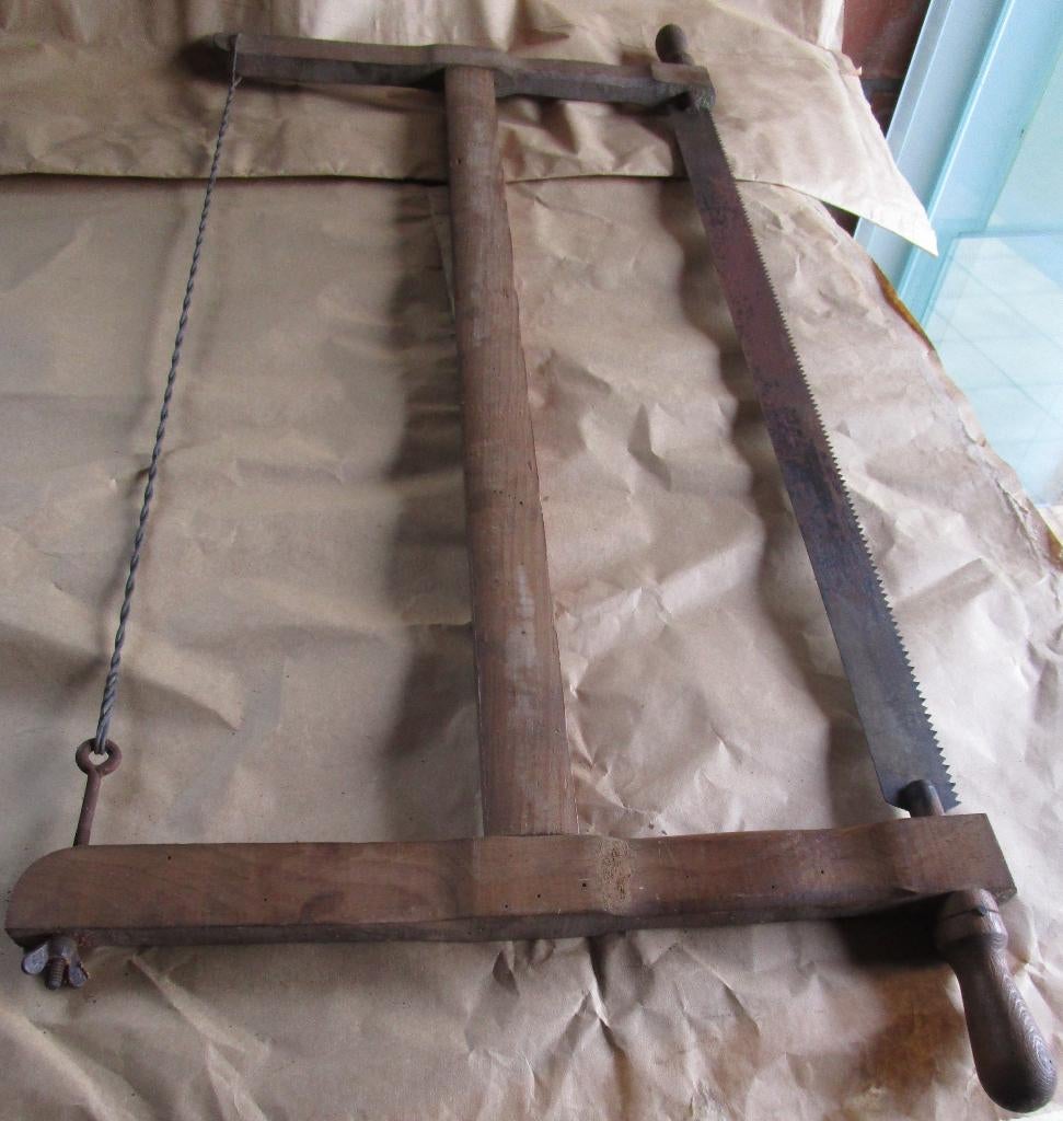 antieke zaag, Ophalen