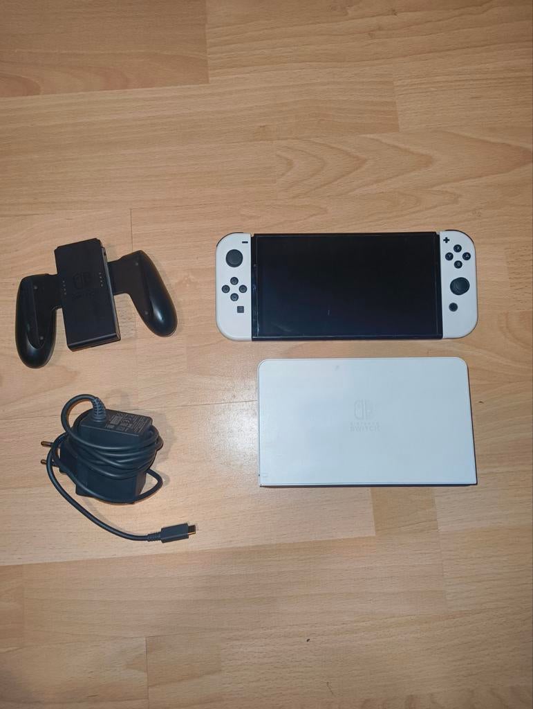 Nintendo Switch OLED, Enlèvement ou Envoi, Comme neuf, Sans contrôleur, Switch OLED