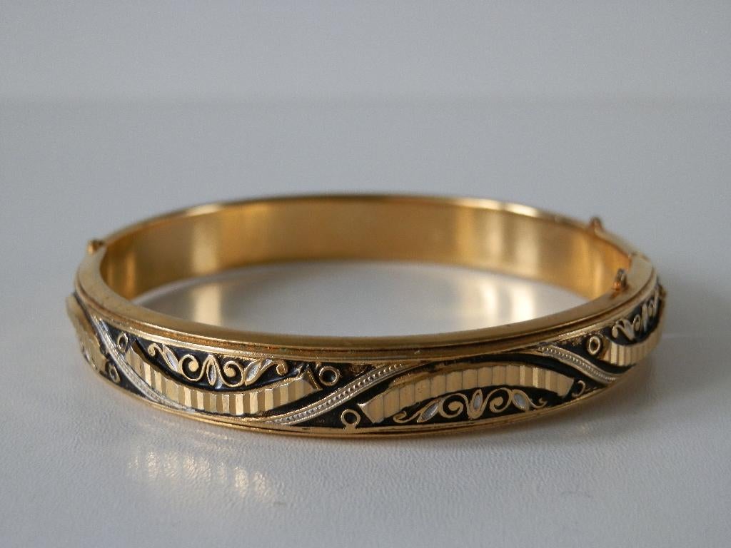 Gouden slavenarmband . Gedamasceerde armband., Ophalen of Verzenden, Zo goed als nieuw, Goud, Overige materialen
